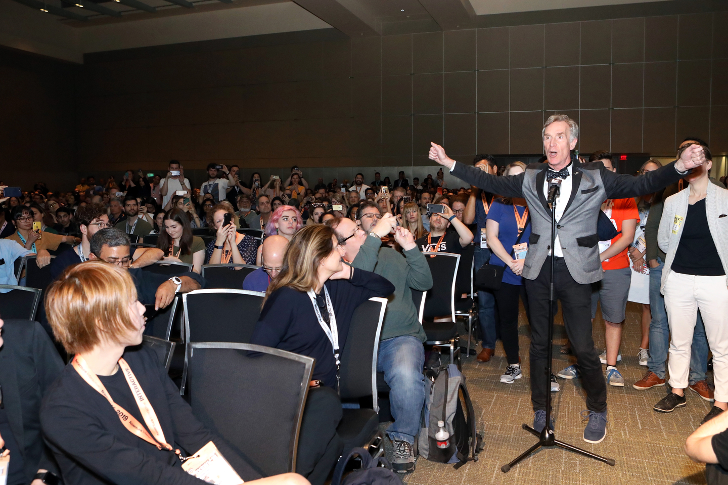 Bill Nye asks Alexandria Ocasio-Cortez a question from the audience. Photo by Samantha Burkardt/Getty Images for SXSW