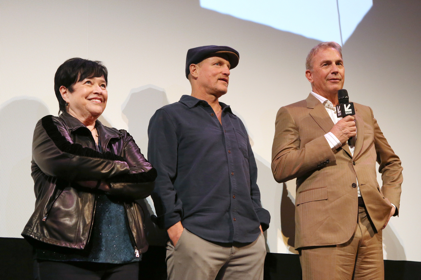 (L-R) Kathy Bates, Woody Harrelson, and Kevin Costner speak onstage at The Highwaymen Premiere at the Paramount Theatre.