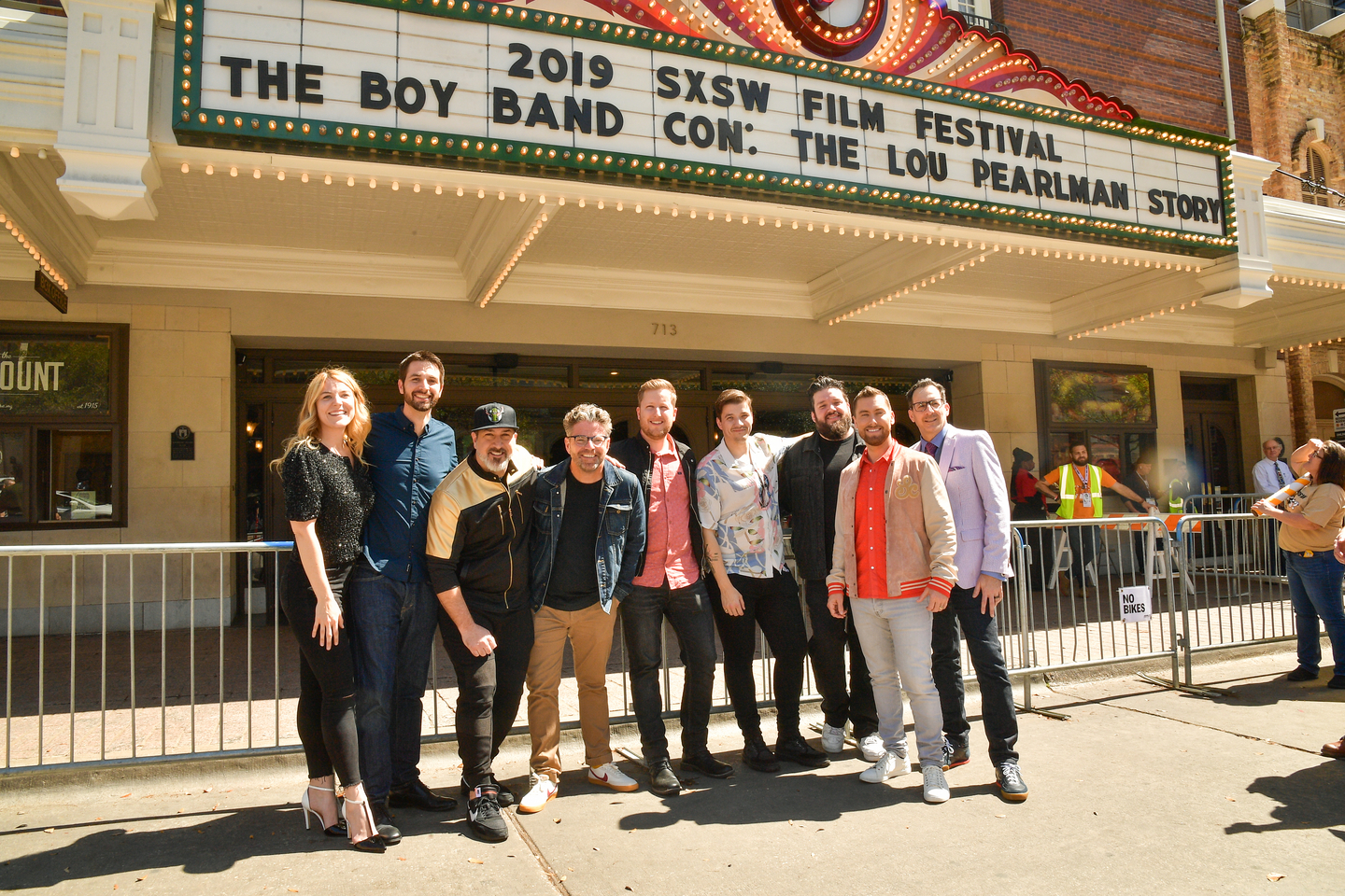 Callie Foster, Shane Patterson, Joey Fatone, Dave Holmes, Aaron Kunkel, Matthew Charles Ducey, Henry Darrow McComas, Lance Bass, and Nicholas Caprio attend the The Boy Band Con: The Lou Pearlman Story premiere at the Paramount Theatre.