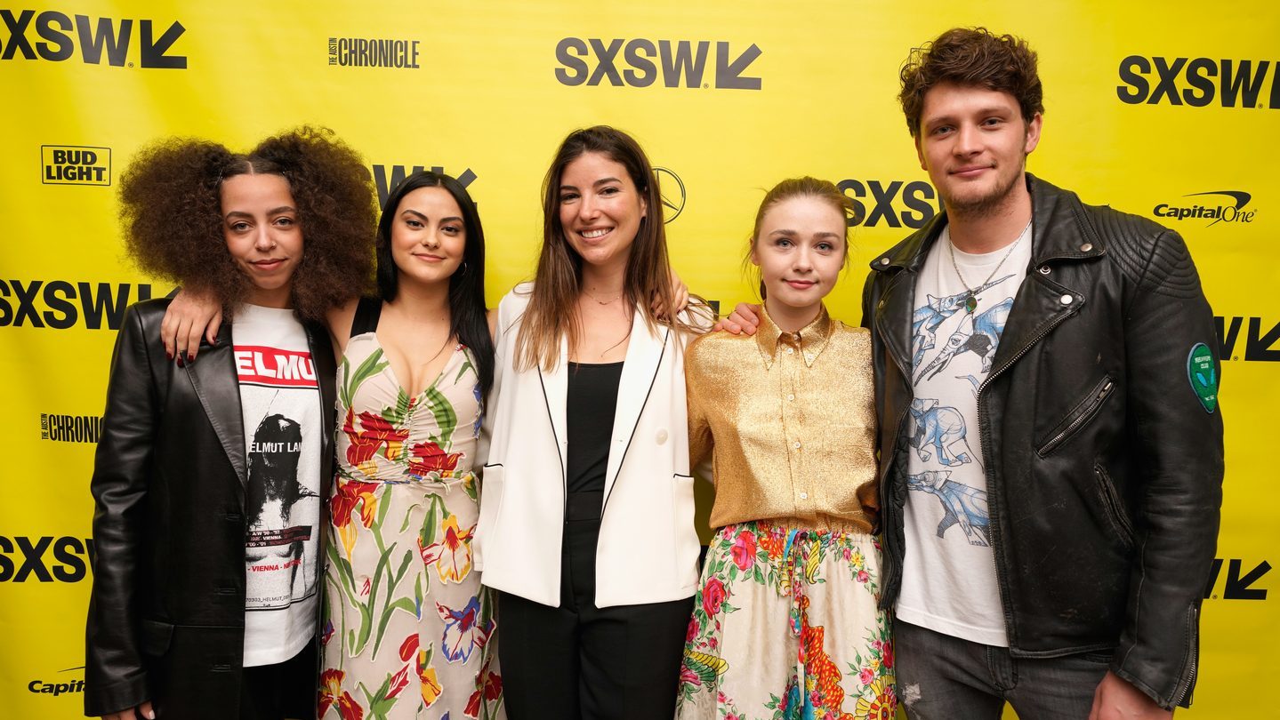 Carly Stone (center) and actors attend the premiere of The New Romantic. Photo by Ismael Quintanilla/Getty Images for SXSW.