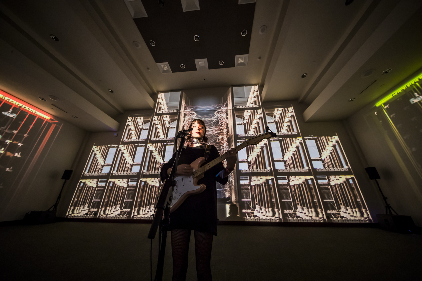 Stella Donnelly performs for NPR’s SXSW Lullabys in front of the Conductors and Resistance installation by Ronen Sharabani, part of the SXSW Art Program, is on display through Saturday in Room 3 at the Austin Convention Center.