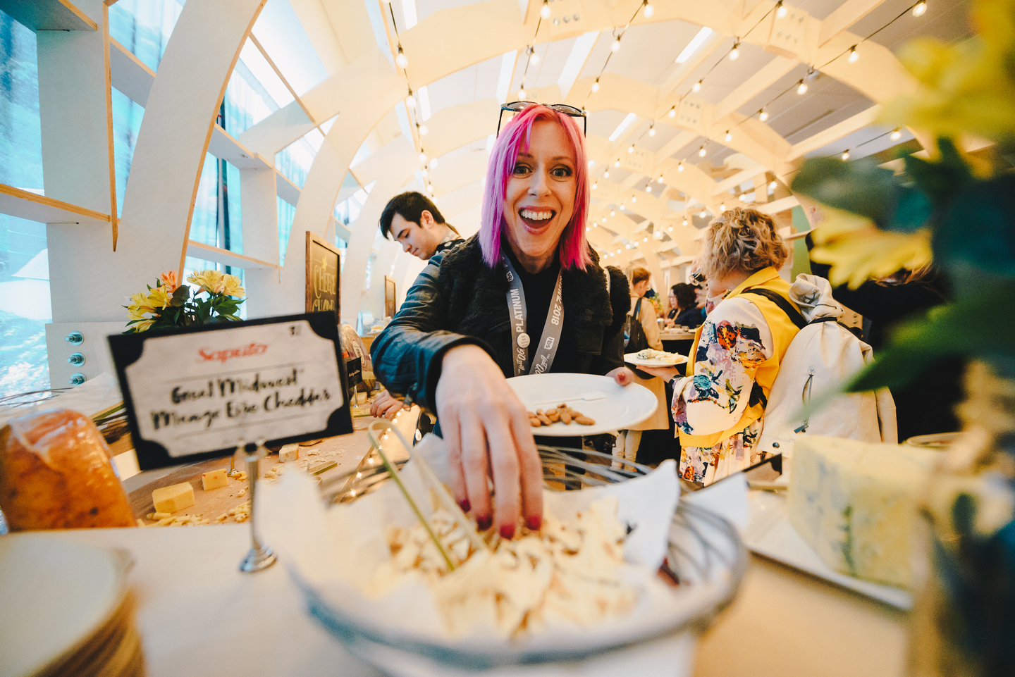 An attendee at The World’s Longest Cheeseboard (from Wisconsin, of course). Photo by Judy Won