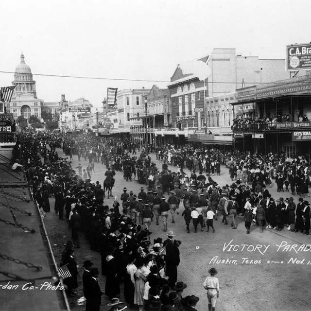 Armistice Day parade celebrating the end of World War I (11/11/1918). Taken from the SW corner of 7th and Congress.