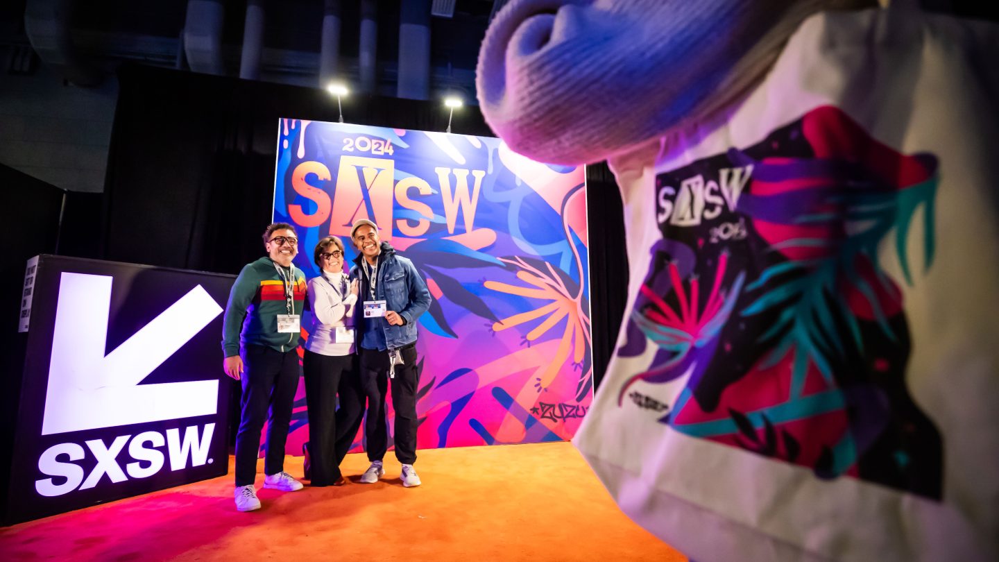 SXSW 2024 Attendees pose for photo at Registration – Photo by Aaron Rogosin